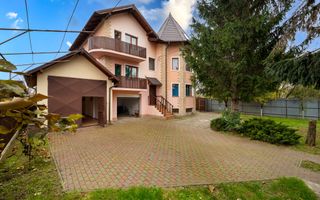 Vilă cu 6 dormitoare, 2 garaje, anexe multiple - 2076 mp teren - Poză 1