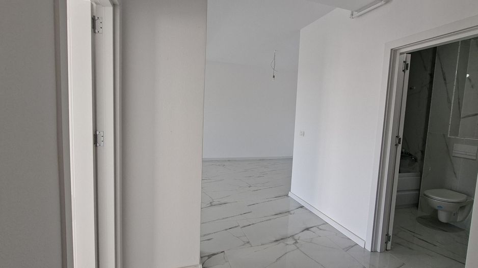 Apartament cu 3 camere si un loc de parcare - Poză 9