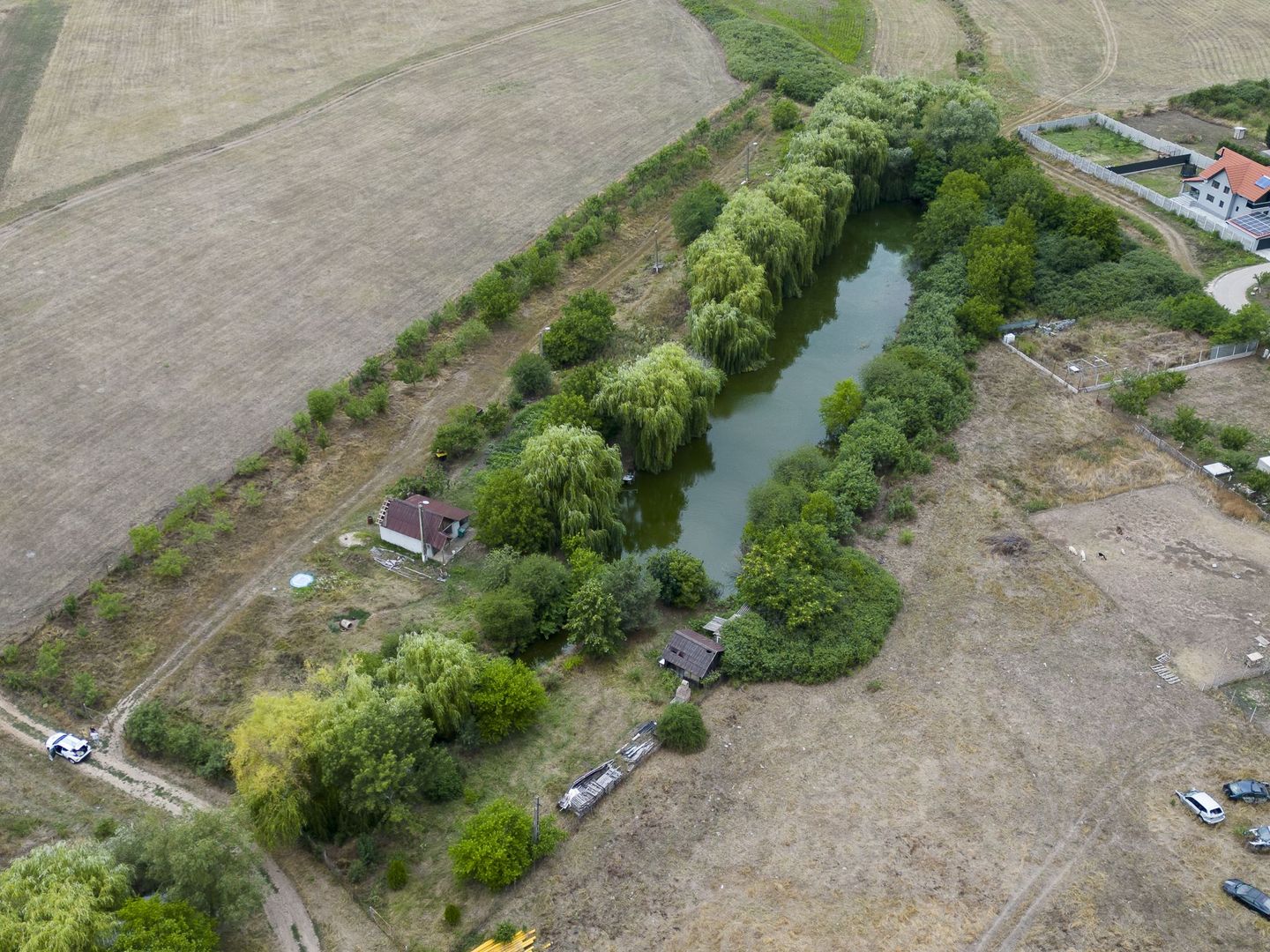 Teren de 7900 mp cu baltă de pescuit în Frumușeni - Poză 1