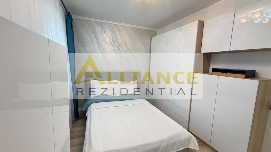 Casa P+1+M cu teren de 650 mp, piscina si curte complet amenajata - Poză 23