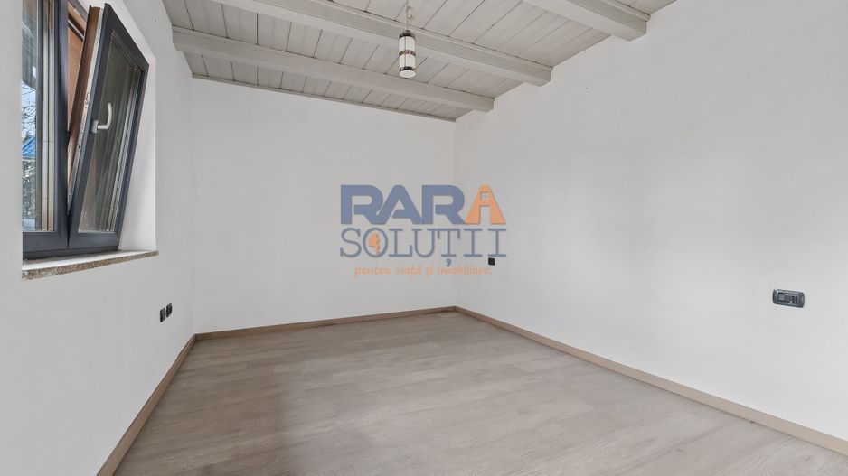 Căsuță renovată modern - Poză 4