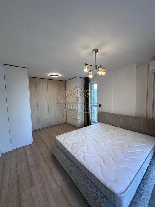 Apartament de închiriat cu 2 camere, aer condiționat, loc de parcare - Poză 2