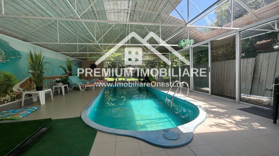 „Vilă cu piscină și teren 1.400 mp în zona Mal, Onești - Poză 1