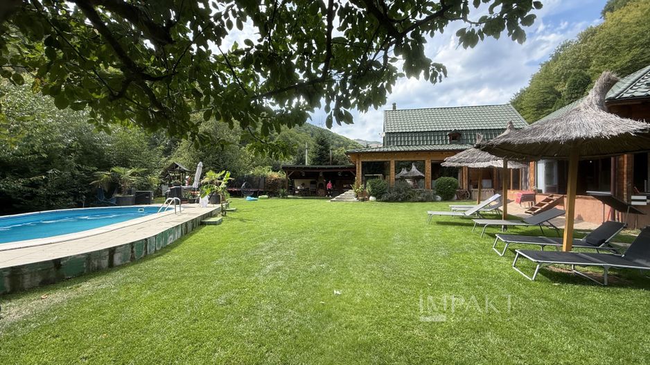 Proprietate cu front la rau si piscina exterioara in Baisoara - Poză 1