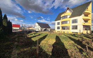 Apartament la casă cu grădină - Poză 1