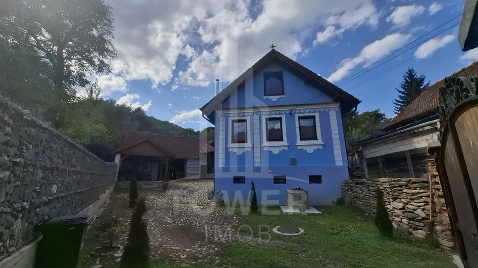 Casa renovata in Fantanele - Poză 3