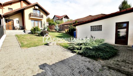 Casa 3 camere, 2 bai,1 garaj,teren 360 mp.zona Dambu Pietros
