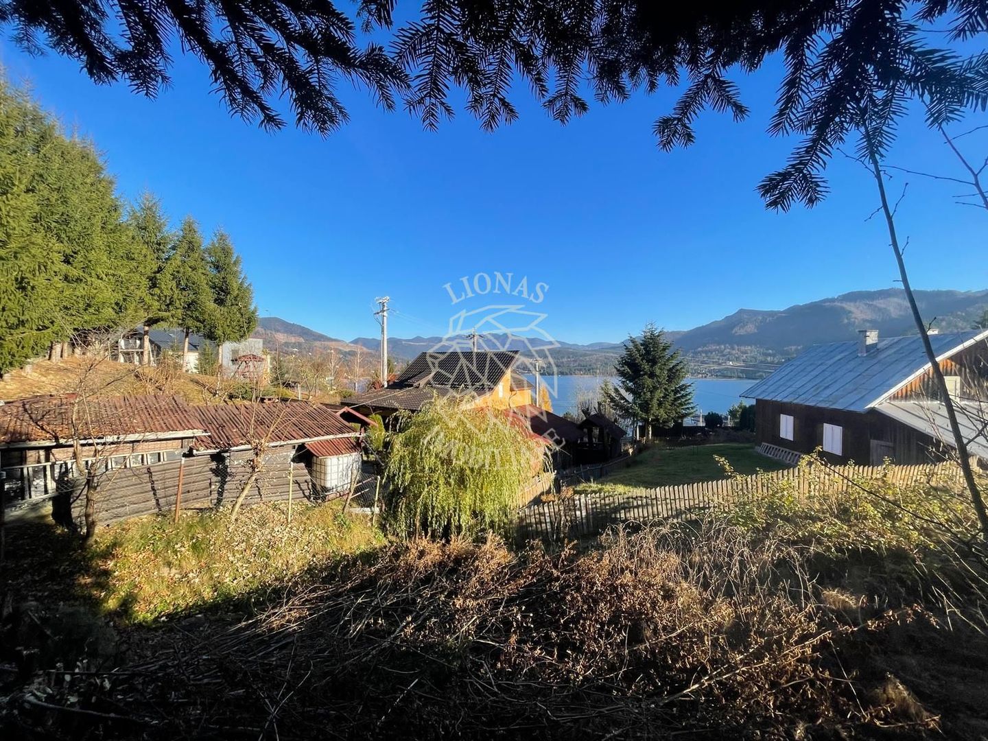 Teren intravilan 500 mp cu utilitati-panoramic-4 min de Lac Colibita - Poză 1