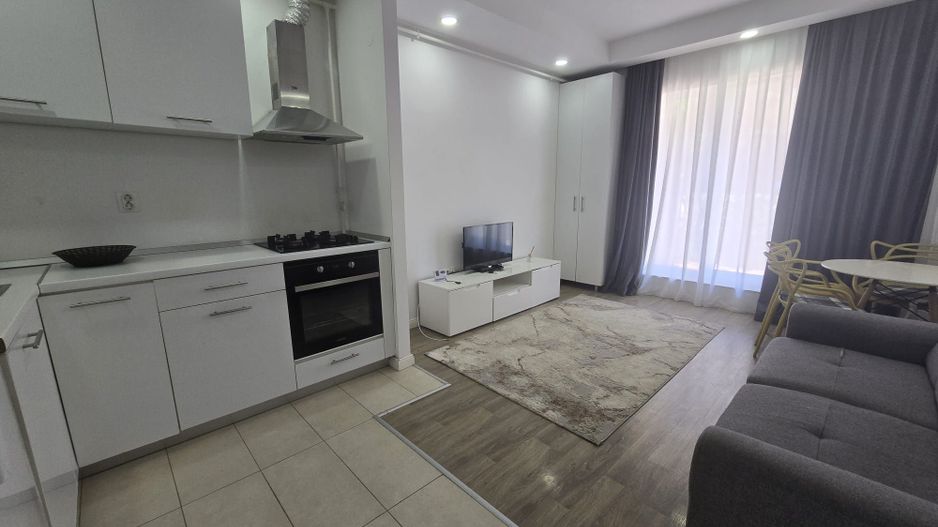 COSMOPOLIS - Apartament cu 2 camere si gradina, mobilat si utilat. - Poză 3