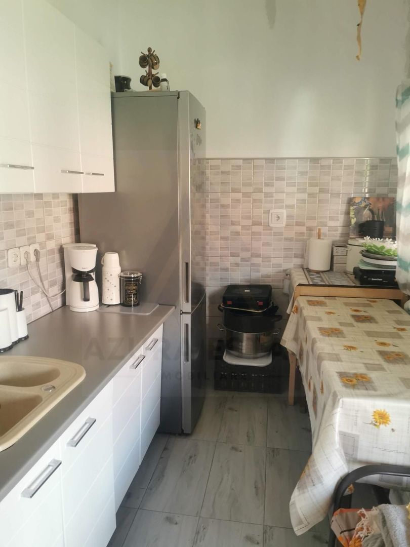 Casa renovata 3 camere teren liber 1250 mp grădină 1400 mp in Colun - Poză 4