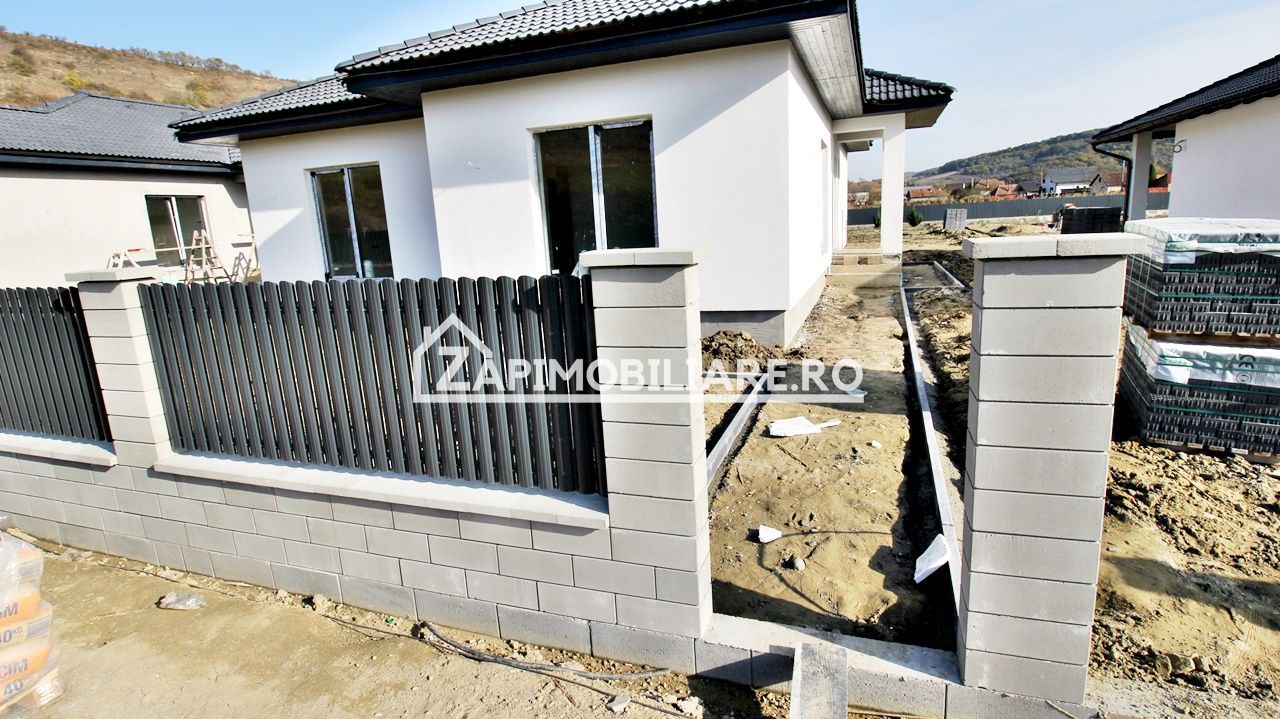 Casă la cheie pe 1 nivel 4cam. 2 bai,1 dresing 650 mp. teren - Poză 23