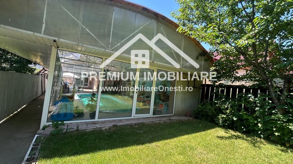 „Vilă cu piscină și teren 1.400 mp în zona Mal, Onești - Poză 13
