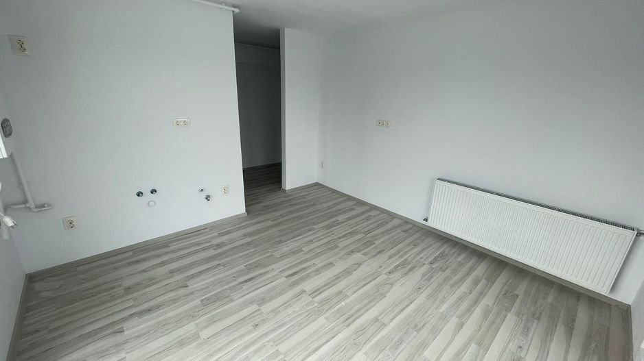 Apartament nou de vânzare Otopeni – 2 camere, balcon, parcare inclusă - Poză 2