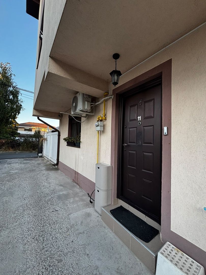 Apartament Modern și Spațios cu Grădină Privată și 2 Locuri de Parcare Incluse! - Poză 3