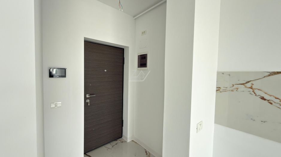 Bloc finalizat. Spatiu de depozitare. Loc de parcare. Clima - Poză 9