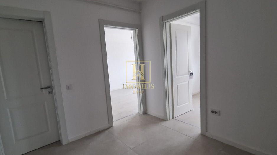 INTABULAT! Apartament 2 camere Dec. 58 mp, 99700 euro-Bucium - Poză 6