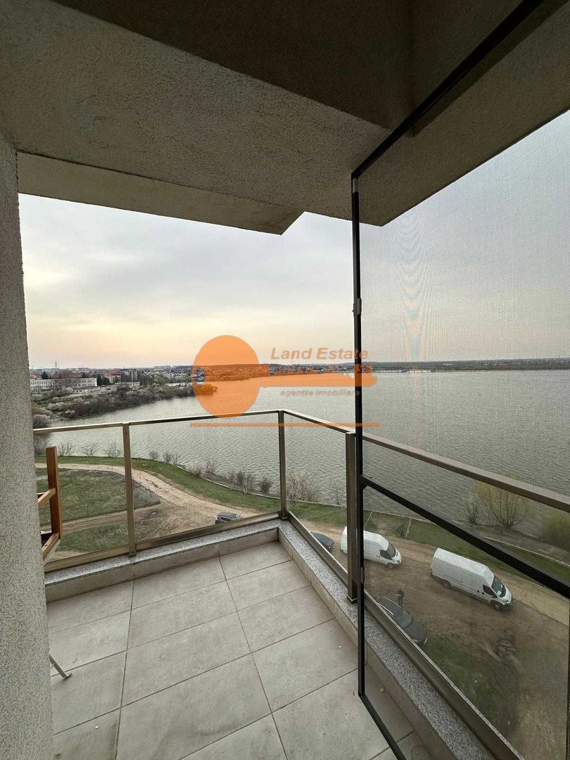 Vanzare 3 camere ( bloc 2020-loc parcare subteran inclus- vedere lac ) - Poză 2