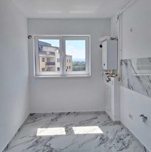 Apartament cu 3 camere situat la etajul 3 zona rezidentiala Rasnov - Poză 2