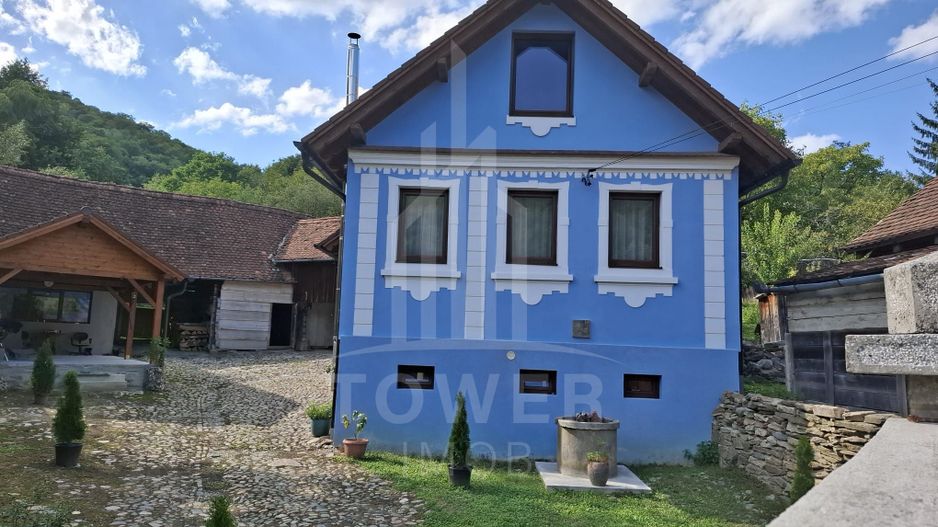 Casa renovata in Fantanele - Poză 1