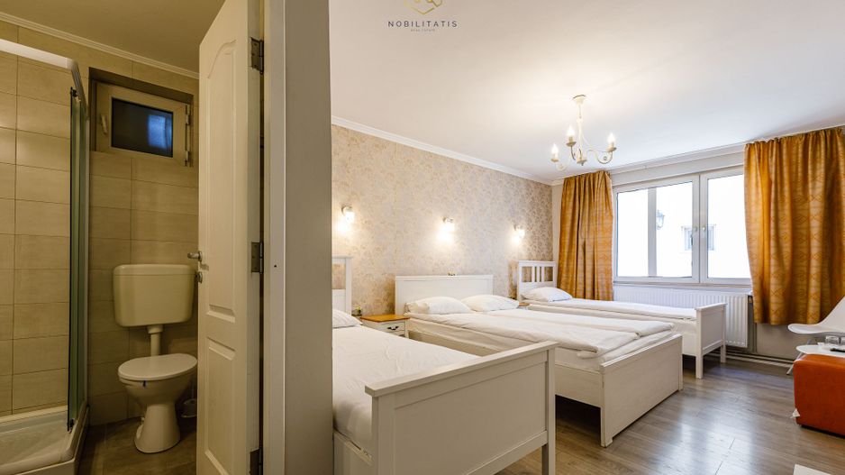 Proprietatea ideala pentru investiție, spații generoase, teren 1.200mp - Poză 30