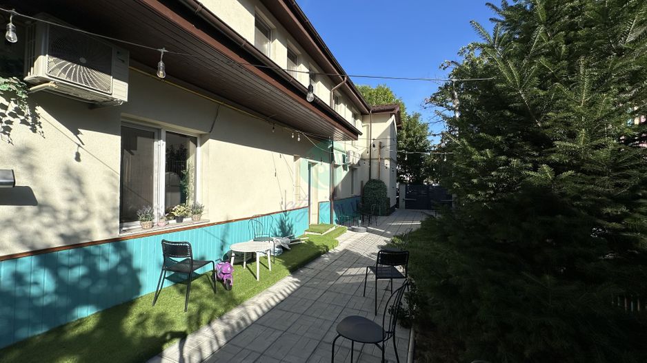 Casa cu o CURTE LIBERA genroasa - Poză 2