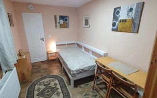 Închiriez garsonieră la casă,  Unirii, centrală proprie - Poză 1