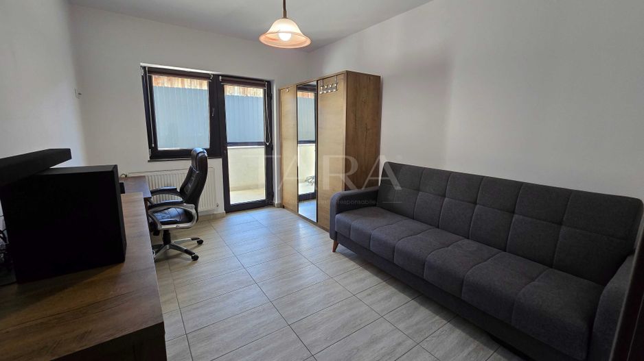 Apartament cu 3 camere si gradina, zona centrala a localitatii - Poză 3