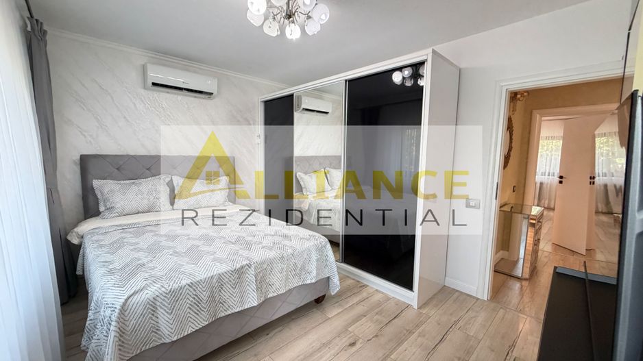Casa P+1+M cu teren de 650 mp, piscina si curte complet amenajata - Poză 27