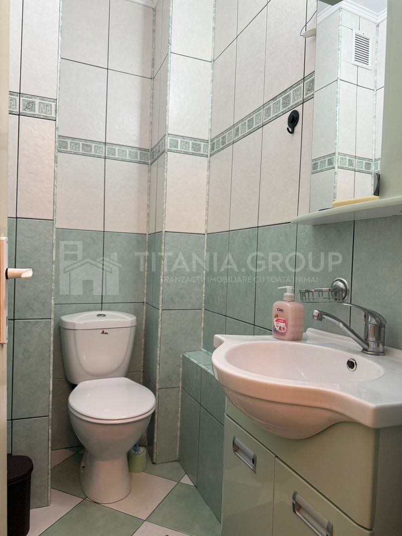 Apartament cu 2 camere, 2 bai, decomandat, etaj 1 - zona Racadau - Poză 9