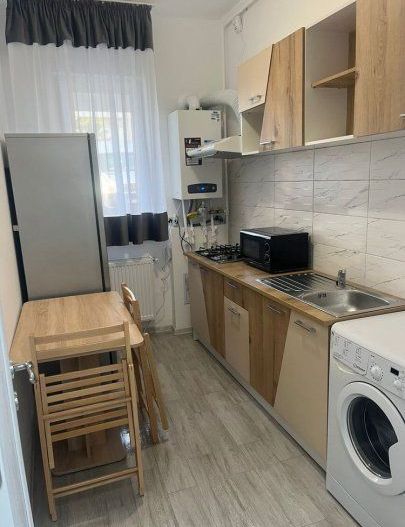 Garsoniera demisol foarte inalt centrala 26 mp - Poză 4