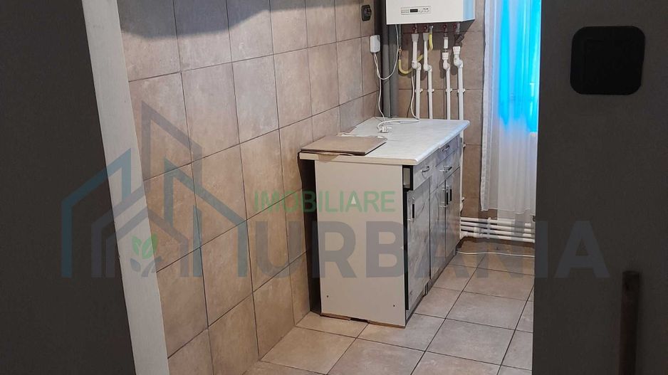 Apartament 2 camere semidecomandat în Tătărași, etaj 1, două balcoane, lângă parcul mare - Poză 2