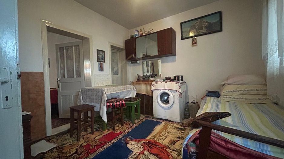 Casă batraneasca+ teren 999 mp intravilan în Oituz - Poză 12