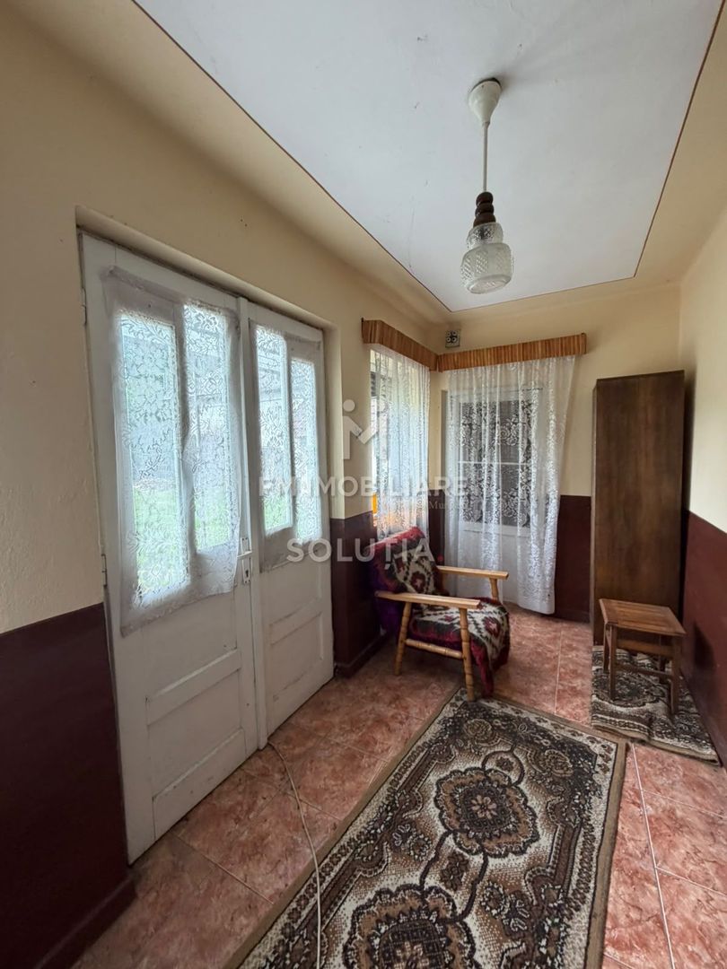 Casă cu teren generos în Buciumi - Poză 10