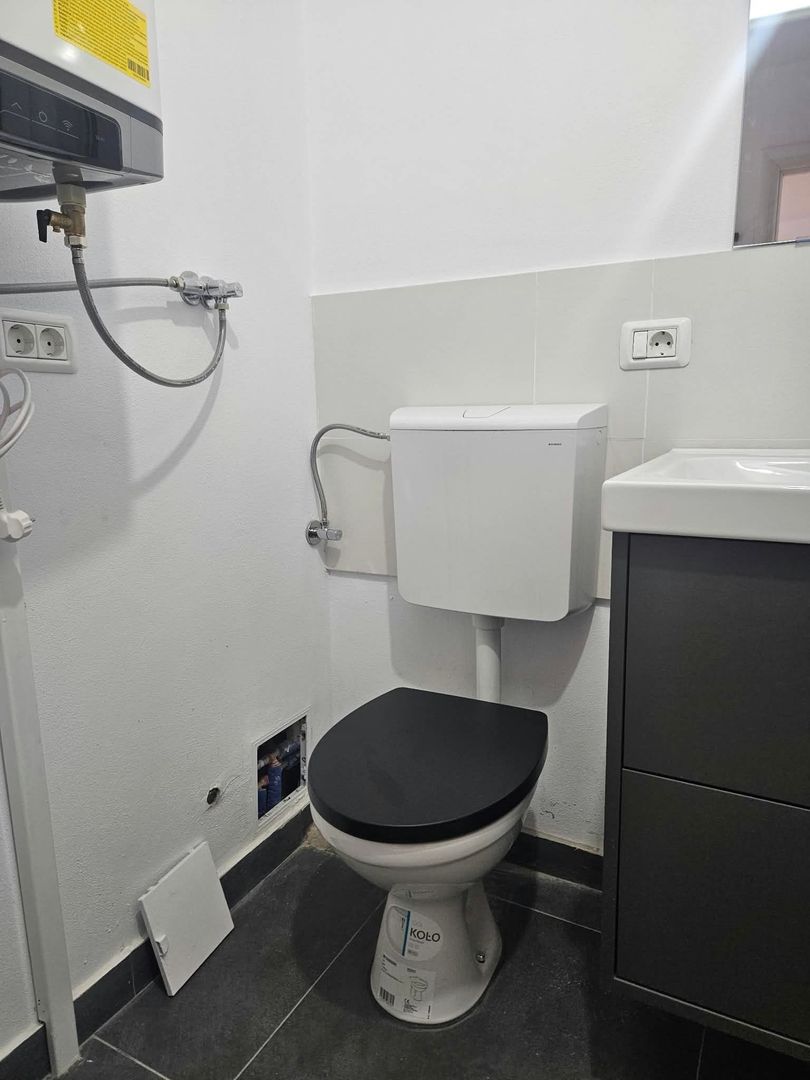 Garii -Garsoniera moderna la prima inchiriere  in bloc de apartamente - Poză 9