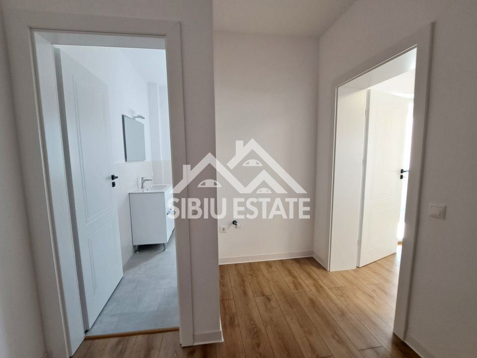 Apartament la cheie cu gradina Selimbar - Poză 11