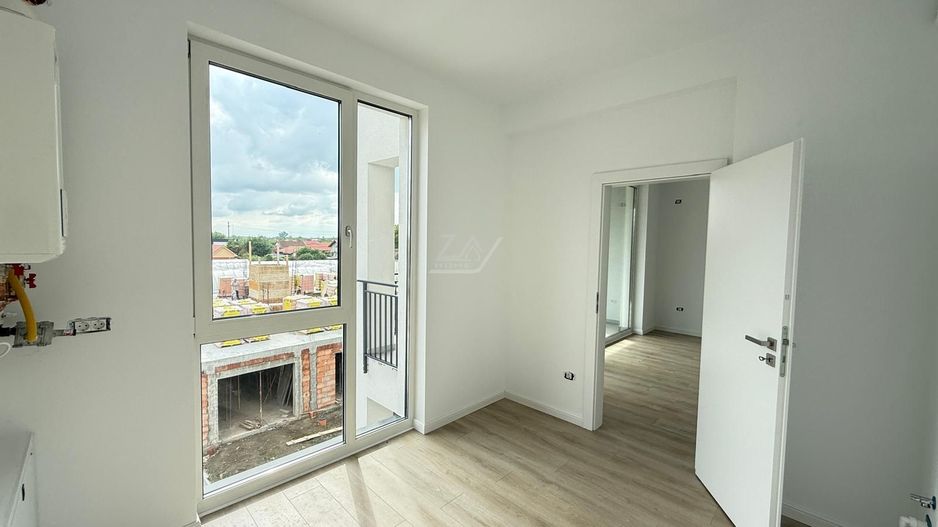 Etaj 1. Bucatarie inchisa. Loc de parcare. - Poză 3