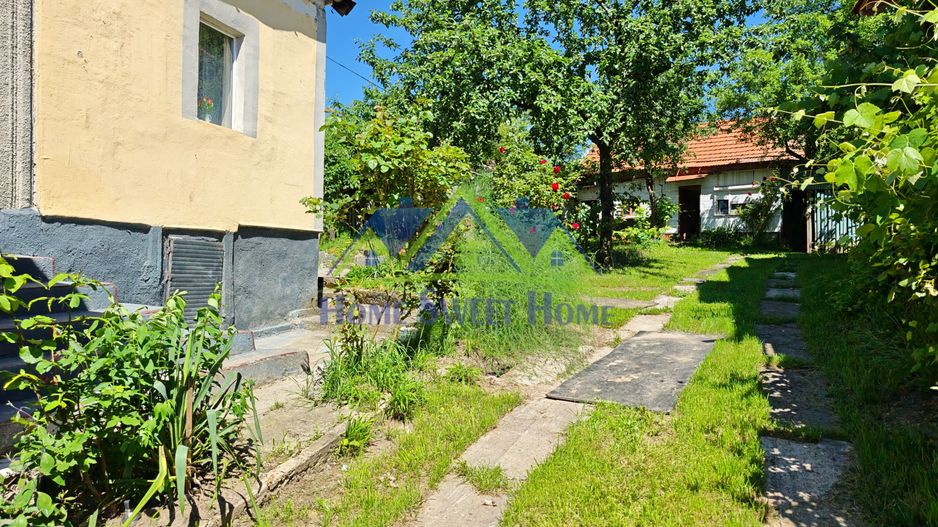 Casa Ghelari, 3 camere, 678mp, baie, buc., termopane, curte si gradina - Poză 2