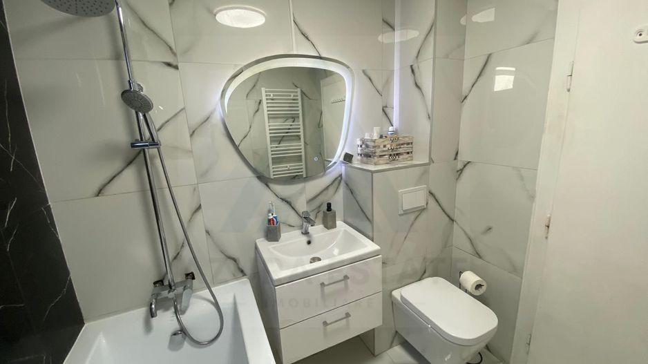 Casa renovata 250 mp utili si teren 935 mp in zona centrala Cisnadie - Poză 9