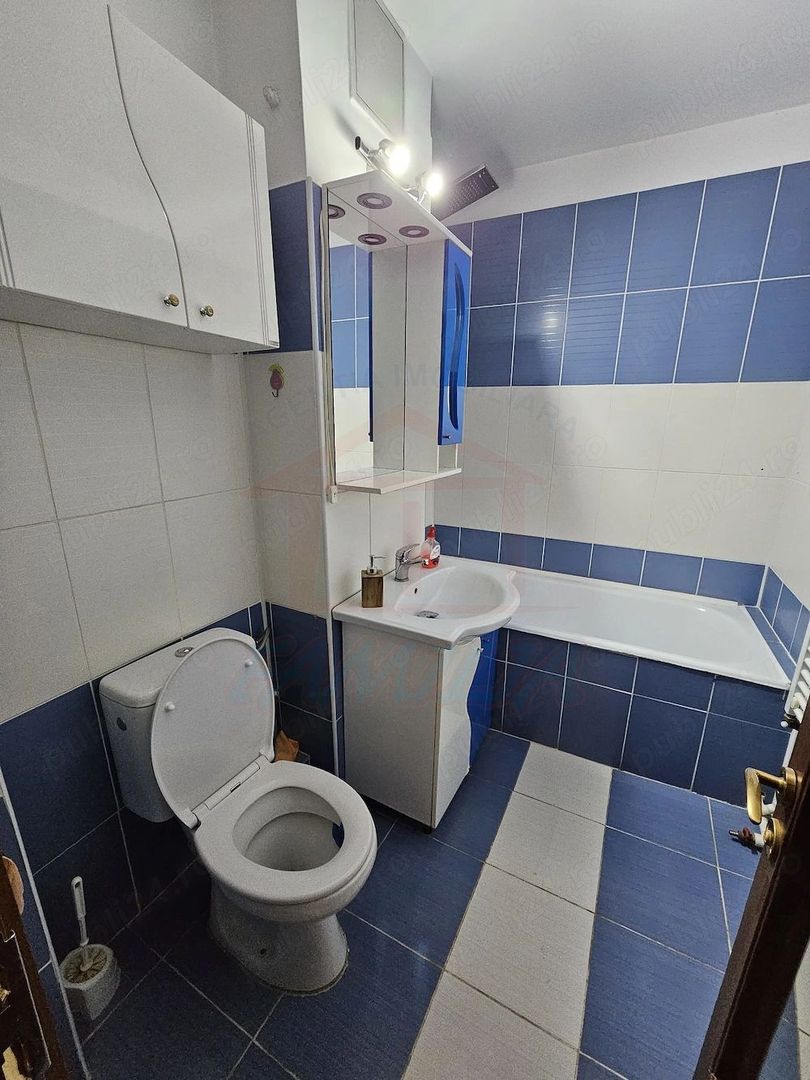 De închiriat apartament 2 camere decomandat -- Baia Comunală - Poză 7