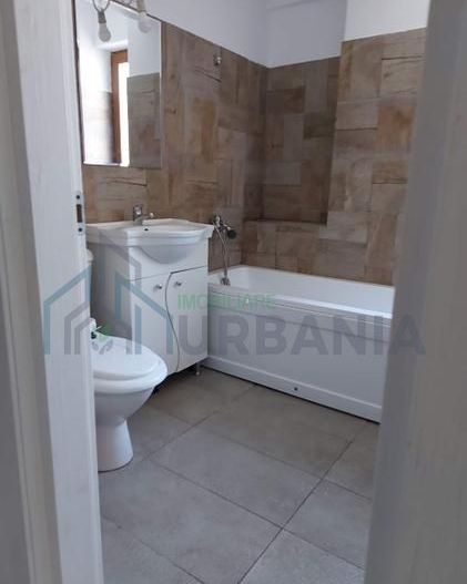 închiriez apartament cu o camera - Poză 6