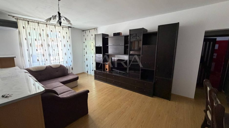Apartament cu 2 camere, parcare inclusă, zona centrală Florești. - Poză 1