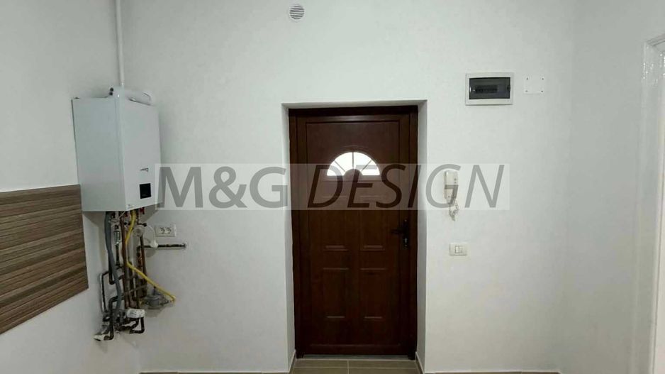 Apartament 1 camera la curte comuna cu centrala - Poză 1