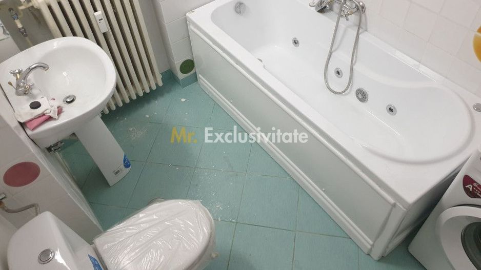 Un frumos apartament de inchiriat vizavi de teatrul Metropolis - Poză 10