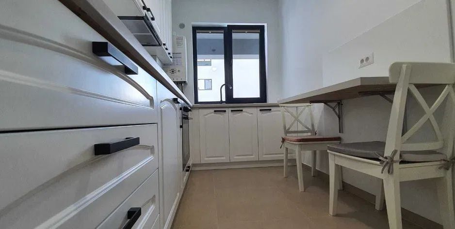 Apartament 2 camere,Dec.,54.6 mp Pacurari 133000 euro + loc de parcare - Poză 2