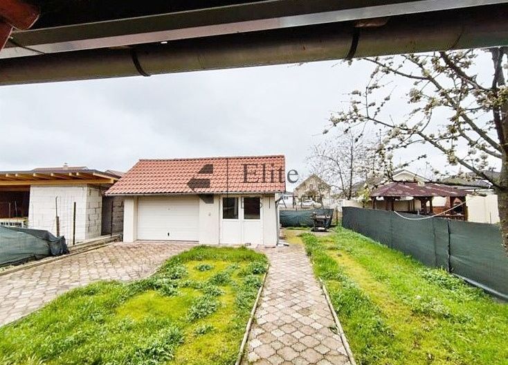 Casa cu 4 camere garaj si curte de 500 mp in Nojorid - Poză 4