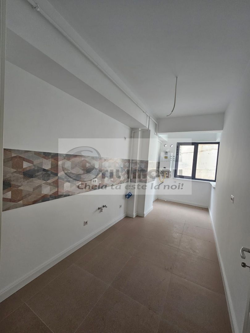 Apartament cu 2 camere decomandat Pacurari 65mp - parcare subterana - Poză 4