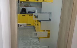Casă individuală cu 2 apartamente separate, teren 650 mp, garaj și terasă - Poză 9