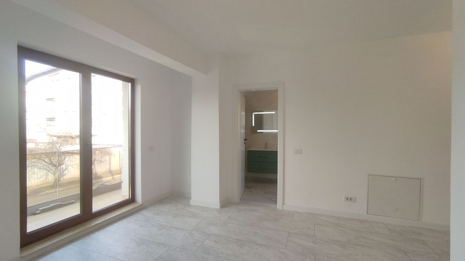 Garsoniera noua de vanzare la 5 minute de metrou laminorului - Poză 1