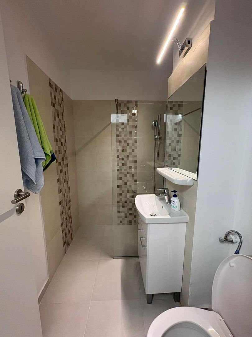 Apartament cu 3 camere de inchiriat in Centru - Poză 2