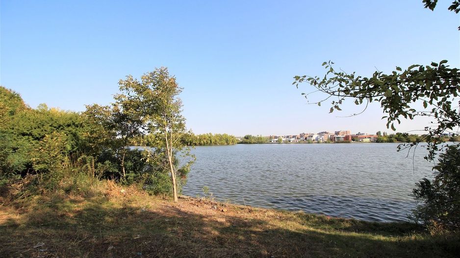 Teren 5963 mp deschidere lac Grivita 42 m cu deschidere la strazi 77 m - Poză 1